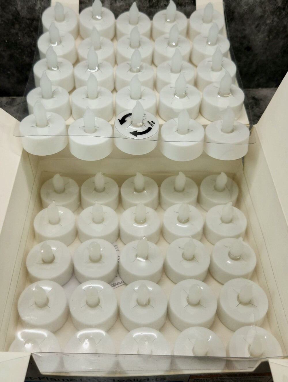 Room Essentials 50 Pack Flickering Twist-Flame LED Tealights, Battery